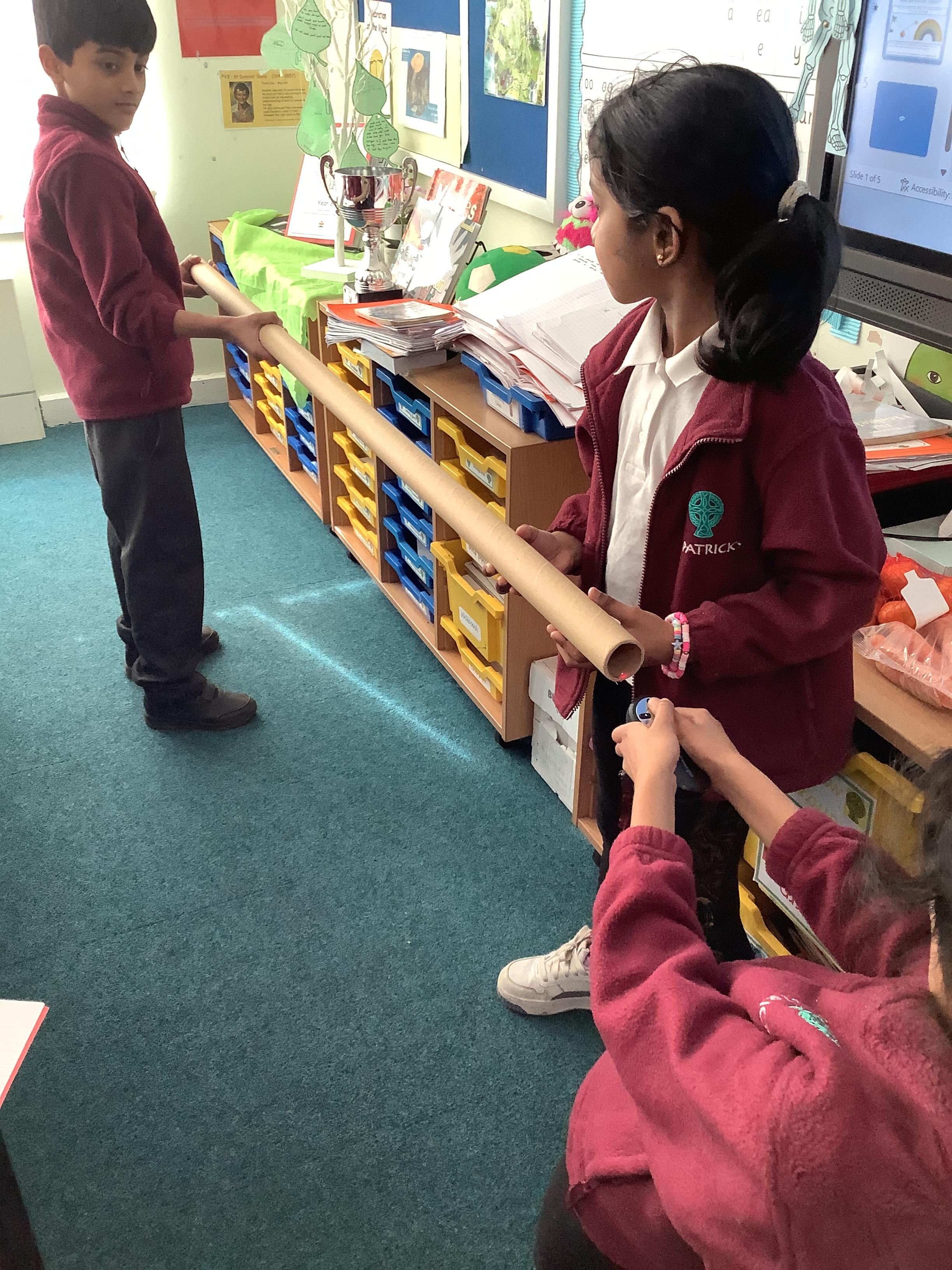 Science-Proving that light travels in a straight line.